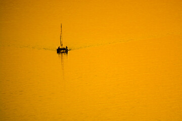 Sailing catamaran at Balatonvilagos in sunset