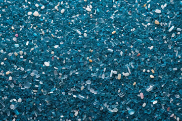 Close-up of microplastic particles background - Pollution concept