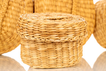 One straw basket, macro, isolated on white background.