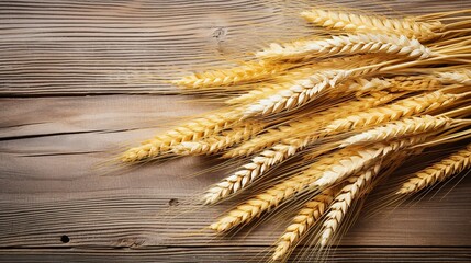 a sheaf of wheat on a brown wooden background