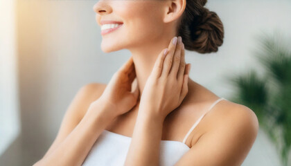 Obraz na płótnie Canvas hands delicately grace flawless bare neck and shoulder, symbolizing skin care and purity on a clean background in this stock photo