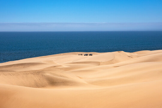 Sand dunes of the Namib Desert and the Atlantic Ocean, Sandwich Harbor, Namib Naukluft Park, Namibia, Africa