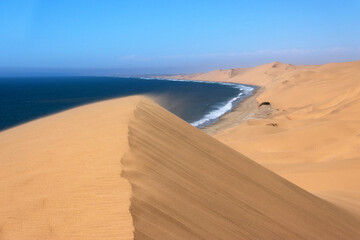 Sand dunes of the Namib Desert and the Atlantic Ocean, Sandwich Harbor, Namib Naukluft Park,...