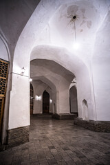 Evening interior of an ancient bazaar building in the ancient city of Bukhara in Uzbekistan