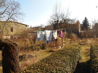 Washing clothes on a line in the garden.