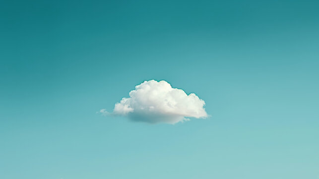Minimalist image of a single cloud in a clear sky.