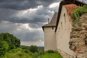 Fototapeta na wymiar Medieval Halych Castle under stormy sky in Ukraine.