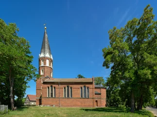 Foto op Canvas Die denkmalgeschützte Dorfkirche Bredow entstand im 19. Jahrhundert anstelle eines bei einem Brand zerstörten Vorgängerbaus © ebenart
