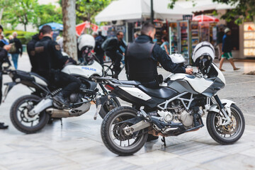 Hellenic Police, Greek police squad on duty riding bike and motorcycle, maintain public order in...