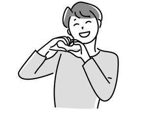 ハンドサインでハートをつくる笑顔の男性