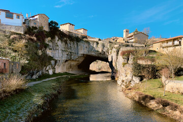 Puentedey, a picturesque village with a natural bridge over the river. Burgos, Castile and Leon, Spain. High quality photography.