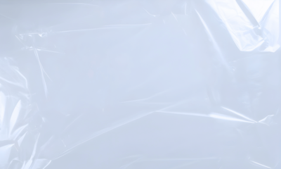 Transparant wrinkled plastic, plastic or polyethylene bag texture. Crumpled white cellophane. White polyethylene texture. Vector illustration	