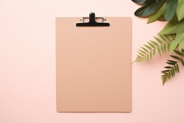 Stylish Minimal Composition with Clipboard and Green Leaves on a Pink Pastel Background AI Generated