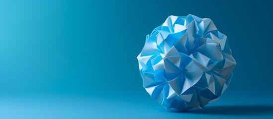 Modular Origami Sonobe Ball on Blue Background: A Stunning Display of Modular, Origami Sonobe Ball in Vibrant Blue against a Captivating Background