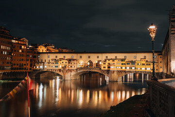 Ponto Vecchio bridge, one of the symbols of Florence. Medieval bridge in the evening.