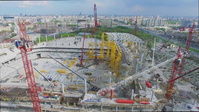 Building site of soccer arena Dynamo near city highway with traffic