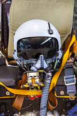 fighter pilot helmet on an ejection seat - 720832373
