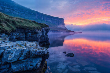 Colorful sky and blue landscape in the early morning dawn on seashore with cliffs, magical, Celtic,...