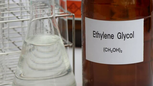 Ethylene Glycol in container, chemical analysis in laboratory, chemical raw materials in industry 