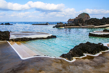 Piscinas Naturais (natural pools) of Porto Moniz among lava rocks on the north coast of Madeira...