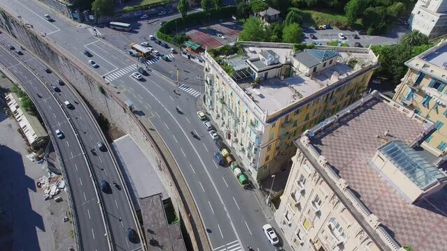 Transport traffic on flyover Aldo Moro near square at summer 