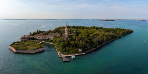 Aerial view of the plagued ghost island of Poveglia in the Venetian lagoon, opposite Malamocco...