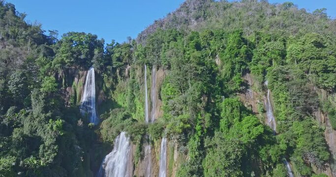 Aerial View Numerous waterfalls flow from wide, steep cliffs. .Thi Lor Su waterfall Nestled amidst the untouched beauty of Tak Province..Thi Lo Su Waterfall The Largest Waterfall in Thailand.