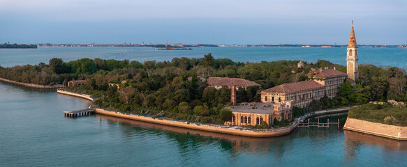 Aerial view of the plagued ghost island of Poveglia in the Venetian lagoon, opposite Malamocco...