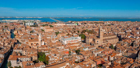 Fototapeta premium Aerial View of Venice near Saint Mark's Square, Rialto bridge and narrow canals. Beautiful Venice from above.
