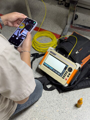fiber optic cable testing in server room.