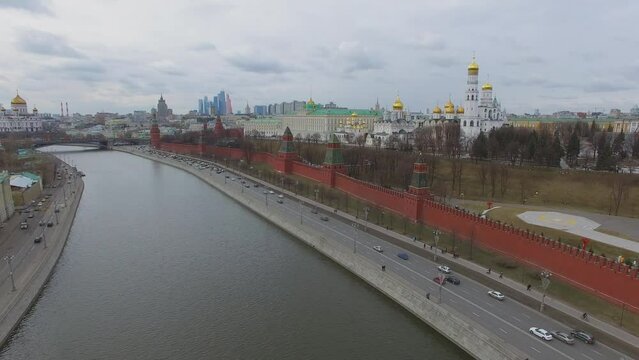Embankments of Moskva river with traffic near Kremlin complex