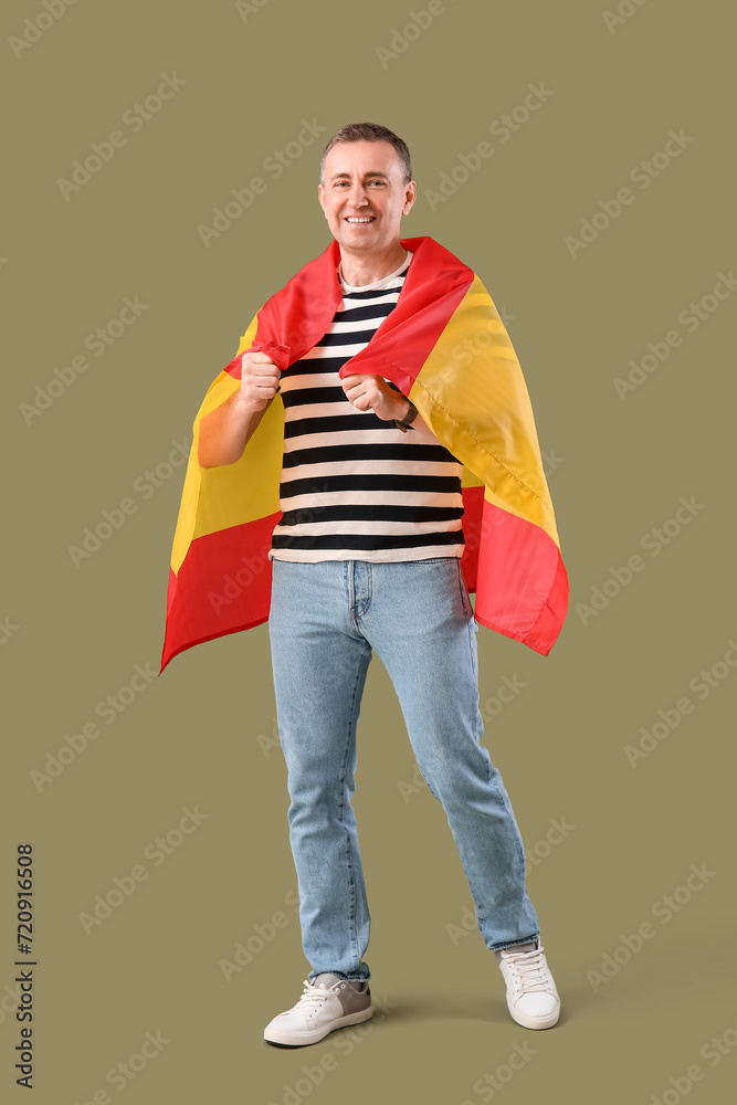 Poster mature man with flag of spain on green background