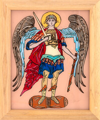 Icon painted on reverse glass in the naive orthodox style of Eastern Europe depicting Archangel Michael. Framed icon.
