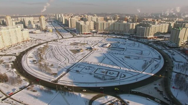 Transport traffic on roundabout in city at winter 