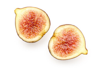 Halves of fresh ripe fig on white background