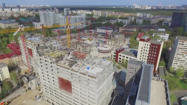 City panorama with construction site of dwelling complex