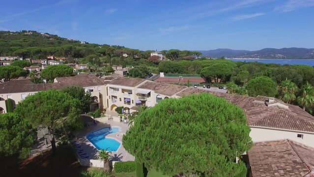 3 stars hotel Caesar Domus and town on shore of sea bay with vessels