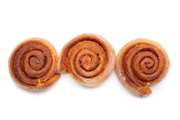Tasty cinnamon rolls on white background