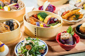 Japanese food in bamboo containers, closeup of a Japanese meal.