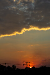 Sunset sky with clouds. Nature background. Orange sunset sky.
