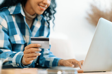 Close up credit card using for online payment, banking and shopping on the internet network with...