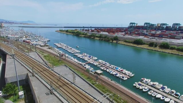 Railroad near Castelluccio Tourist landing Marina and Voltri Terminal Europa port