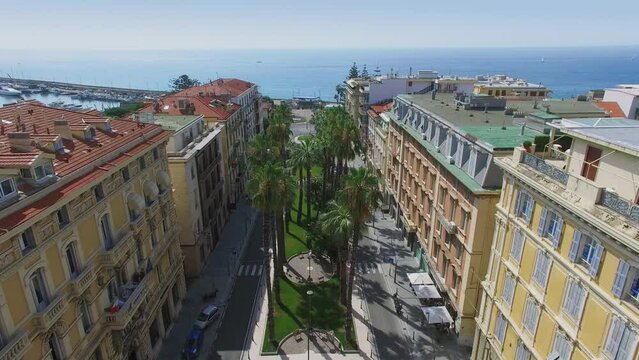 Houses on Corso Augusto Mombello and seascape at summer