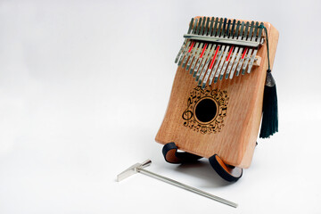 Kalimba is a percussion musical instrument. It is a modern version of the mbira musical instrument from southern Africa. Another name is the thumb piano from Africa, photos from several views