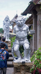 Panglipuran Village, Bali, Indonesia - January 20, 2024: Close up photo of the statue in Panglipuran village