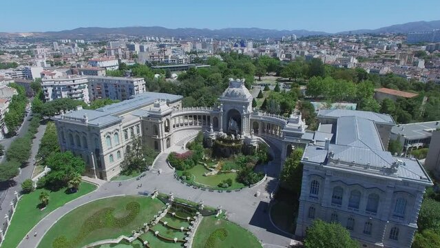 Palace Longchamp with cascade fountain and four district of Marseille