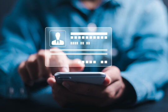 Digital identification or digital ID concept. Businessman use smartphone with virtual screen of digital identification card to accessing databases by digital identity for cyber security.
