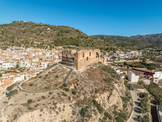 Obraz premium Aerial view of Castellnovo castle, medieval hilltop ruins near Segorbe Spain with rectangular tower