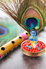 Sri Krishna statue with peacock feather. Lord Krishna Standing with Flute Vishu festival Kerala