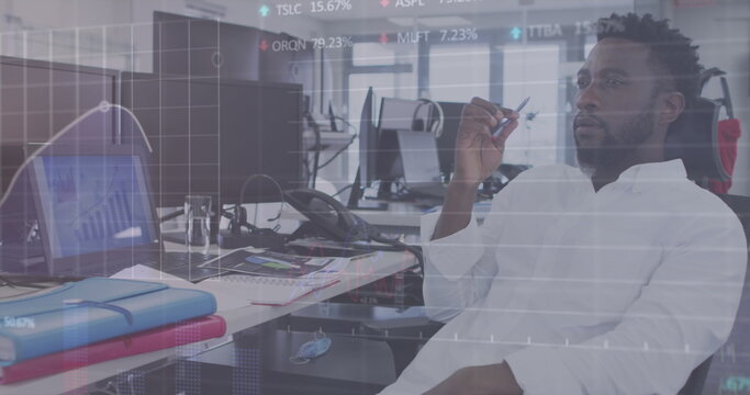 Image of digital interface showing statistics with man working in an office